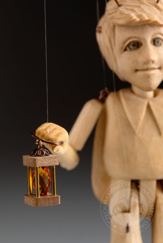The smallest marionette in the world - a wooden hand-carved bug
